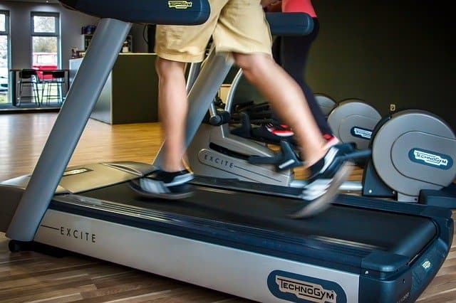 Image of a person running on a TechnoGym treadmill