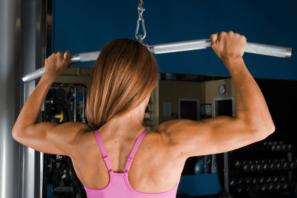 Image of a woman doing a lat pulldown