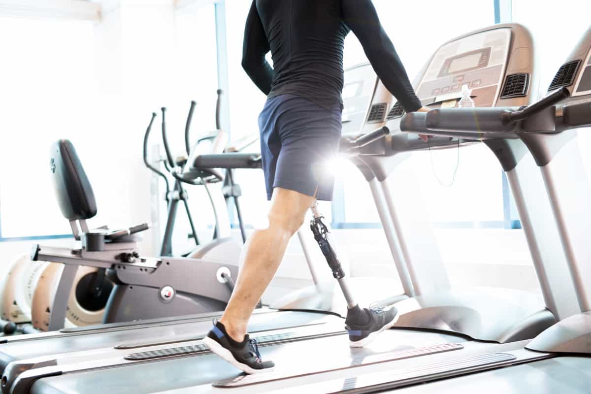Image of a man walking on a treadmill