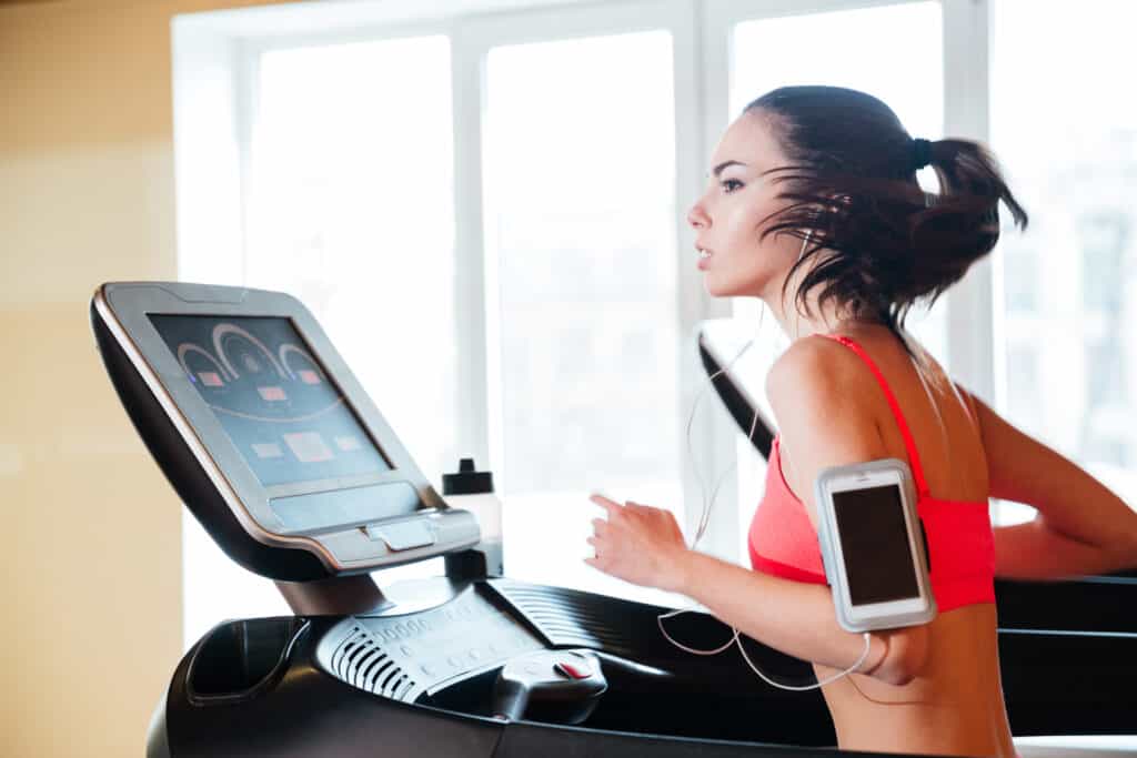 Image of a woman running on treadmill.
