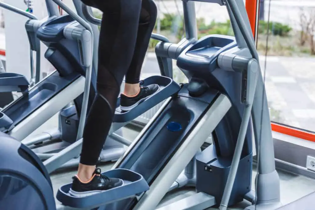 Image of a woman using an elliptical trainer