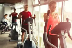 Image of people on an elliptical trainer