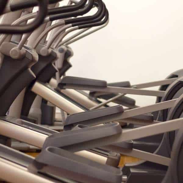 Image of a row of elliptical trainers.