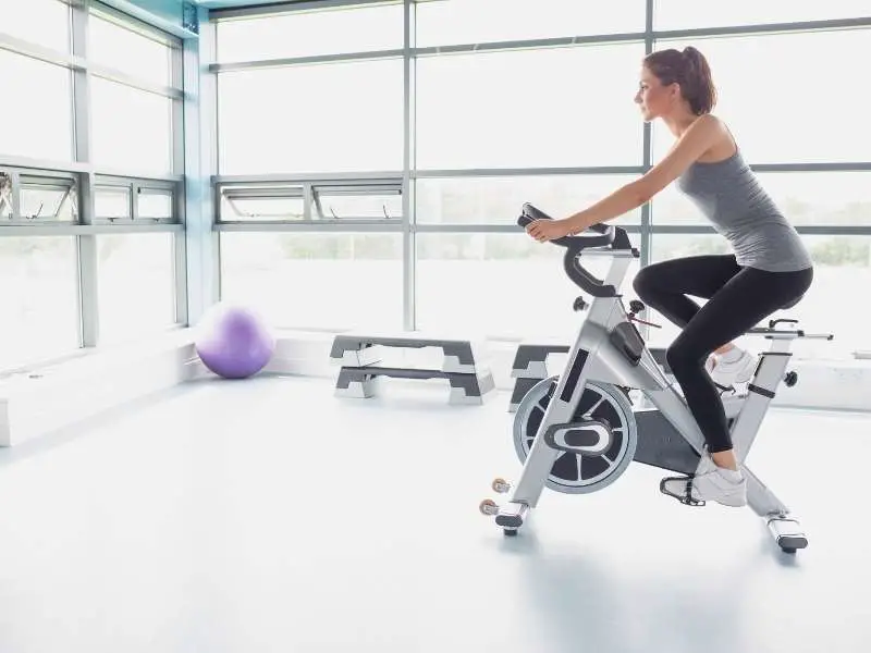 Image of a woman on an exercise bike