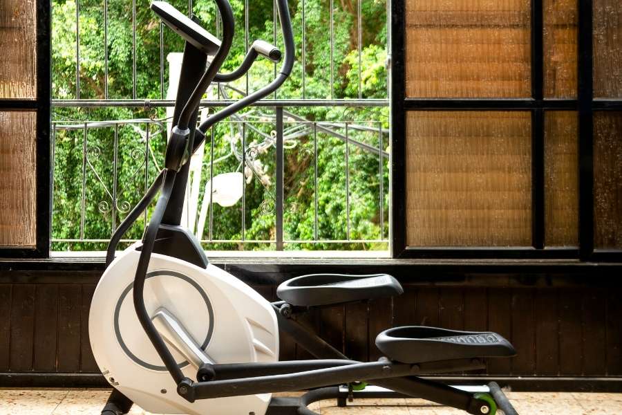 Image of an elliptical trainer in a room.