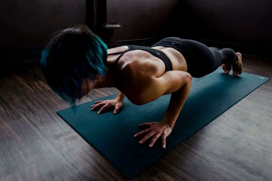 Image of a woman doing push ups