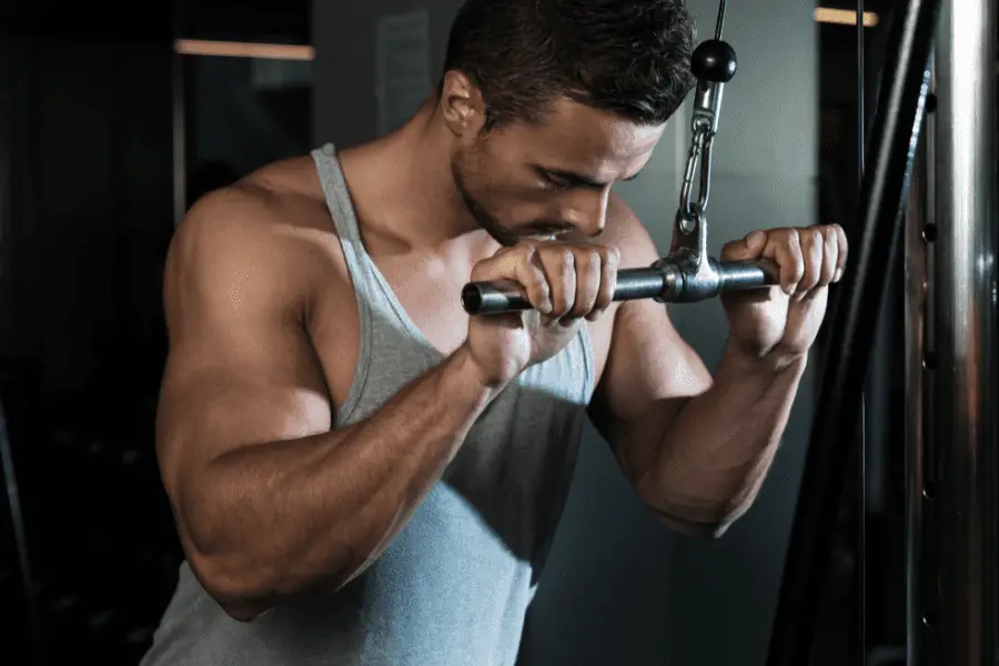 Image of a man doing triceps extensions