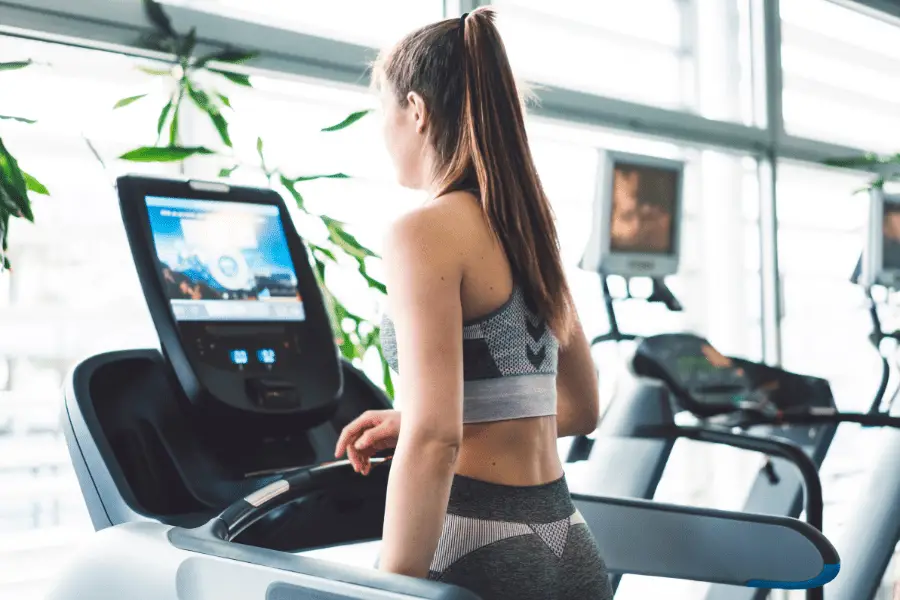 Image of a woman using a treadmill