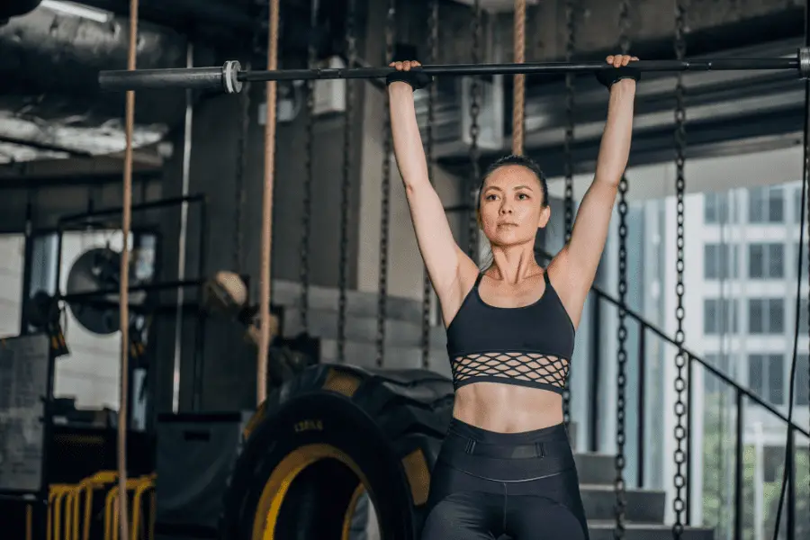 Image of a woman lifting a barbell