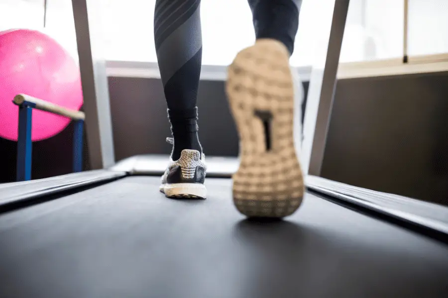 Image of a person walking on a treadmill