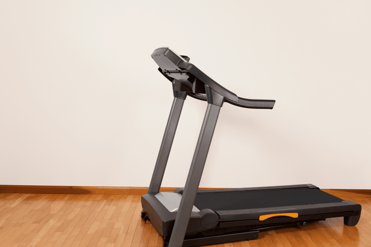 Image of a treadmill on a wooden floor.