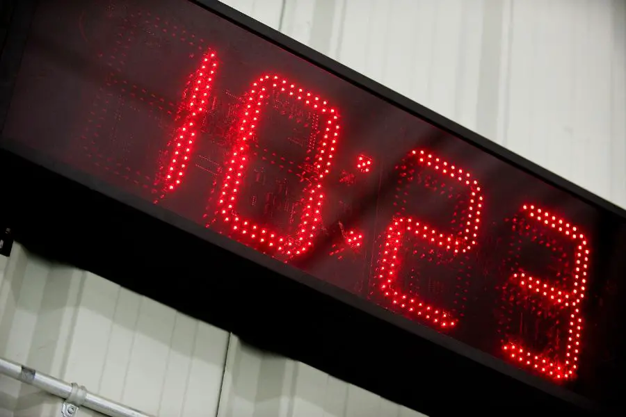 image of a large LED interval timer on a gym wall.