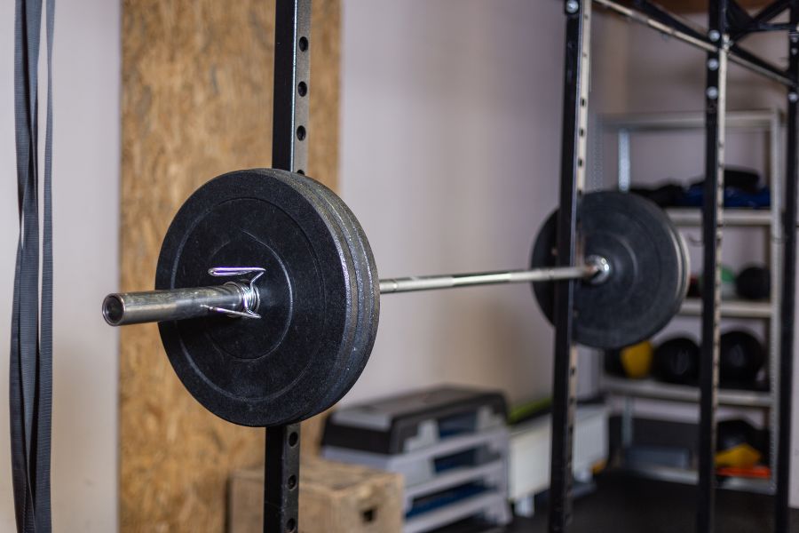 image of a loaded barbell on a rack